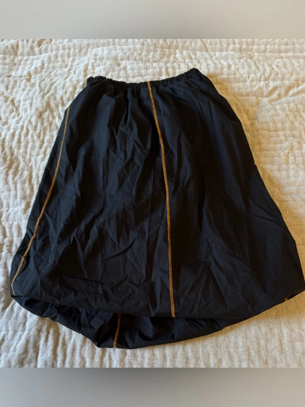 BASERANGE The Turn Skirt In Black Organic Cotton Contrast Stitch Twisted Seams